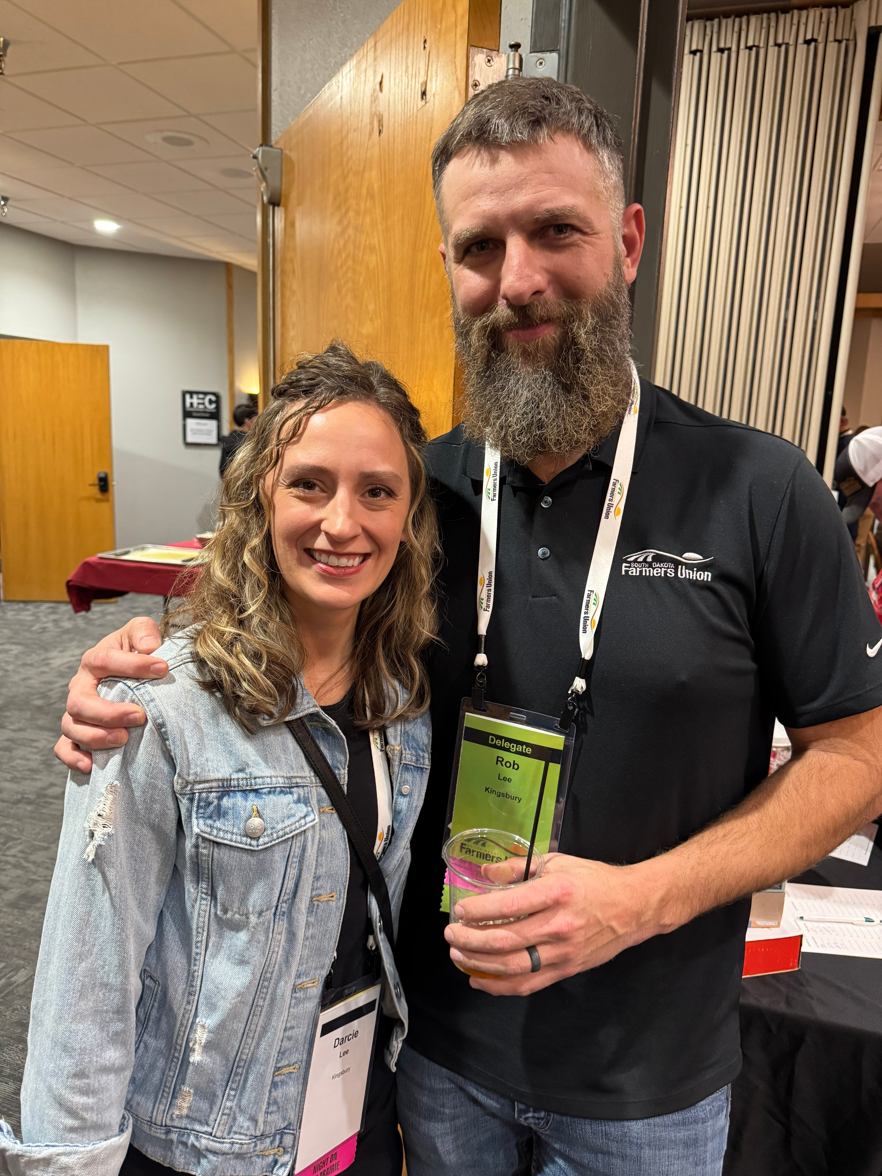 Two event attendees posing together